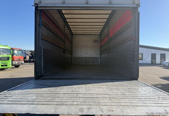 Camión plataforma con toldo Scania R164LB 4x2 Plane/HB / Swiss-Vehicle