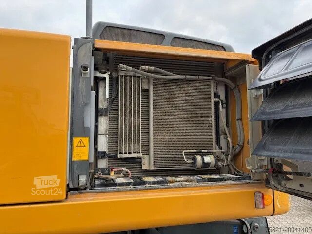 Колесный экскаватор Liebherr A 920 Litronic Likufix SW 48 + Powertilt