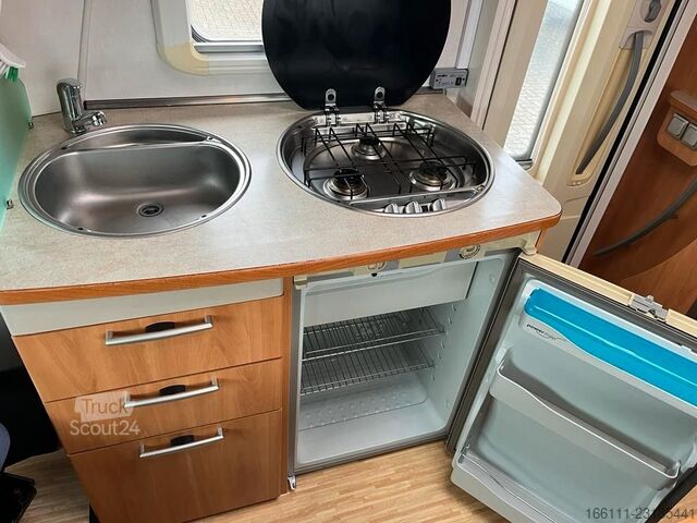 Camping-car semi-intégré HYMER/ERIBA T 578 SL - Festbett - Sat/TV - Solar - 2 x Klima