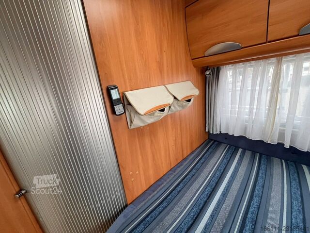 Camping-car semi-intégré HYMER/ERIBA T 578 SL - Festbett - Sat/TV - Solar - 2 x Klima