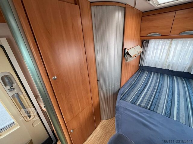 Camping-car semi-intégré HYMER/ERIBA T 578 SL - Festbett - Sat/TV - Solar - 2 x Klima