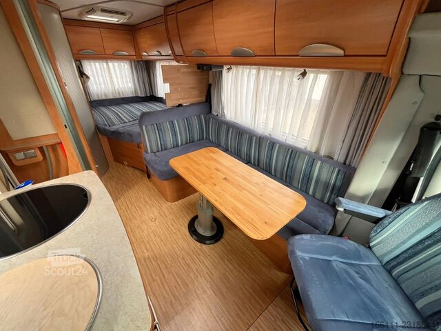 Camping-car semi-intégré HYMER/ERIBA T 578 SL - Festbett - Sat/TV - Solar - 2 x Klima