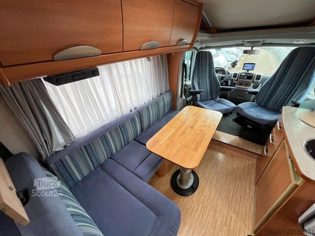 Camping-car semi-intégré HYMER/ERIBA T 578 SL - Festbett - Sat/TV - Solar - 2 x Klima
