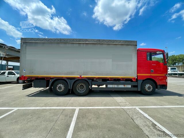 LKW mit Pritsche & Plane MAN TGA 26.460