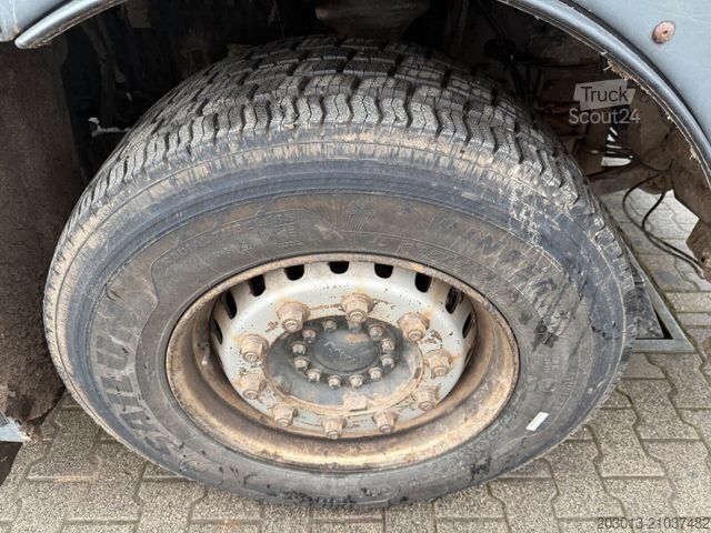 Haakarm vrachtwagen MAN TGX 26.440 Abrollkipper HYVA 20.60.S