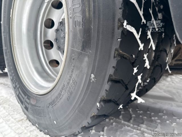 Hakowiec MAN TGX 26.440 Abrollkipper HYVA 20.60.S