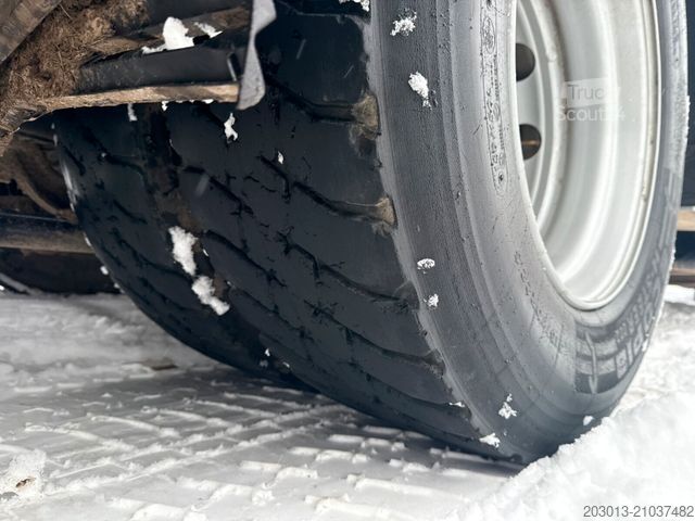 Hakowiec MAN TGX 26.440 Abrollkipper HYVA 20.60.S