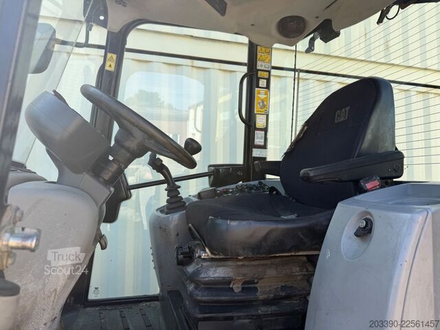 Pyöräkuormaaja CATERPILLAR 908M / 2015 BJ / 7.656 H / Schaufel + Gabel