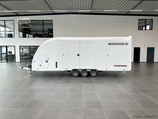 Automobilių gabenimo furgonas Brian James Trailers RACE TRANSPORTER 7 | 397-6023-35-3-10-W | TRIDEM | ZUSATZRAMPEN 600X235X199CM 3500KG GESCHLOSSENER AUTOTRAILER | WEISS