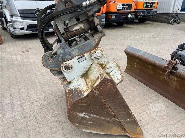 Kolové rypadlo New Holland MH Plus 2wege Bagger