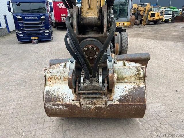 Kolové rypadlo New Holland MH Plus 2wege Bagger