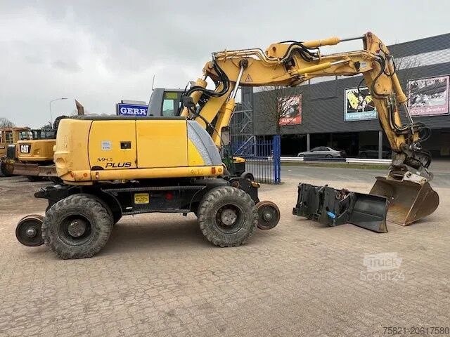 Kolové rypadlo New Holland MH Plus 2wege Bagger