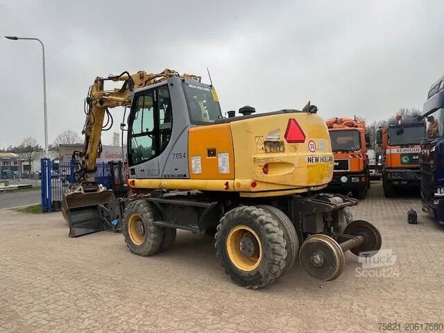 Kolové rypadlo New Holland MH Plus 2wege Bagger