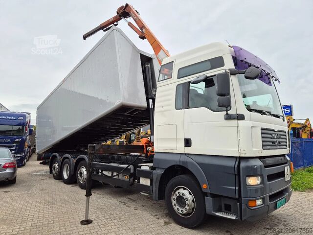 Volquete con grúa MAN TGA 32.410