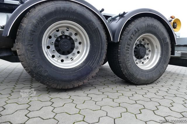 Trīspusējā pašizgāzēja piekabe MÜLLER-MITTELTAL 20 to. Tandem Haken-Containeranhänger