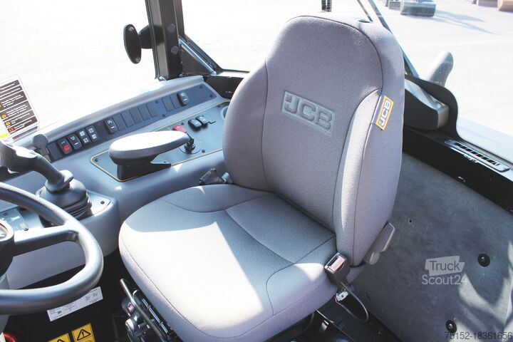 Kolesový nakladač 406 stupeň V + vidlica + lyžica JCB 406 Stufe V inkl. Gabel + Schaufel