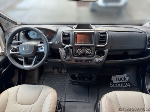 Teilintegriertes Wohnmobil Bürstner B66 TD 690 G Hubbett*Automatik*SAT