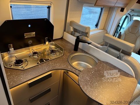 Teilintegriertes Wohnmobil Bürstner B66 TD 690 G Hubbett*Automatik*SAT