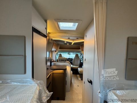 Teilintegriertes Wohnmobil Bürstner B66 TD 690 G Hubbett*Automatik*SAT