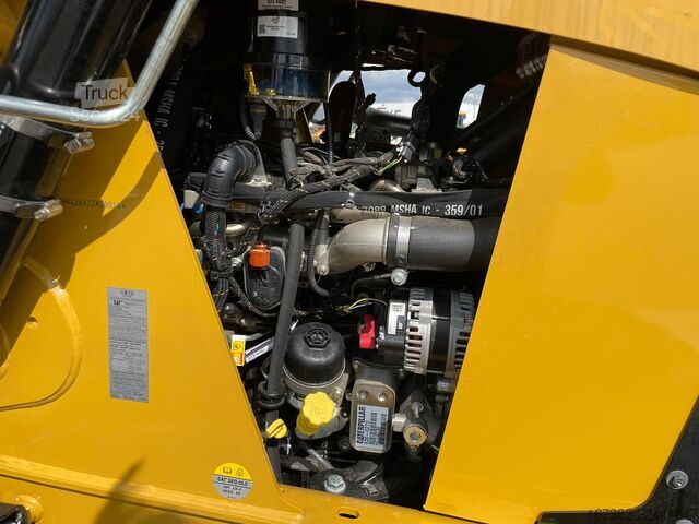 Combinação escavadora/carregador Caterpillar 424
