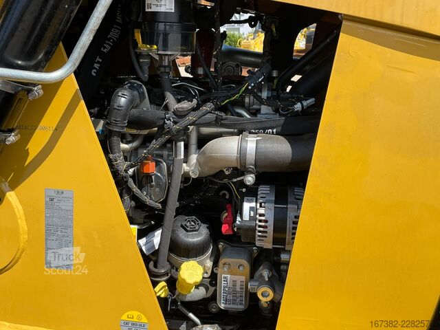 Комбинация багер/товарач Caterpillar 424