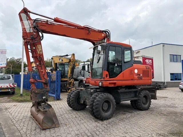 Wheel excavator Komatsu PW 160 - 7EO