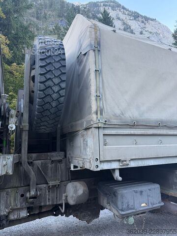 Вантажівка з платформою і тентом MAN 19.281 4X4 FAHRSCHULE 128000 KILOMETER ERSTER AT