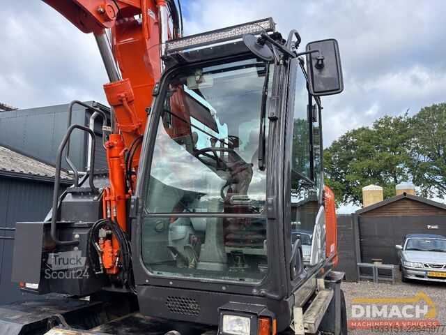 حفارة Hitachi ZX140W-6 SMP draaikantelstuk met grijper - airc...
