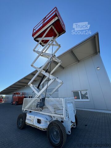 Elevador de tesoura JLG 3369LE--EK