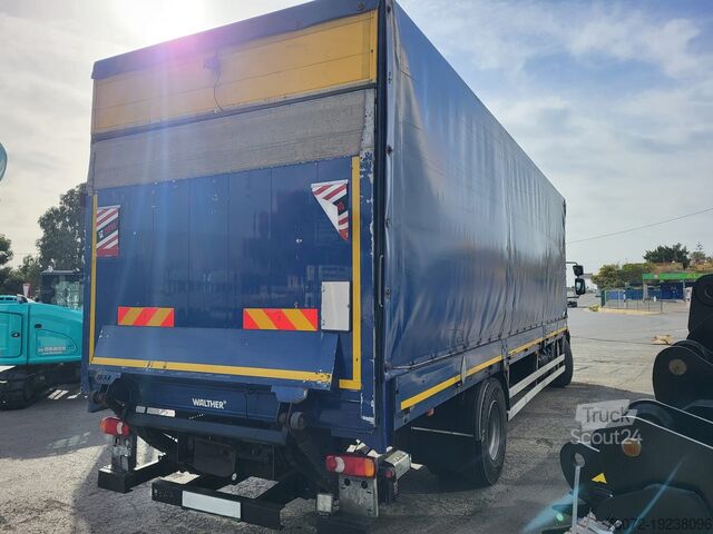 Nákladní automobil s plošinou a plachtou Volvo FL280