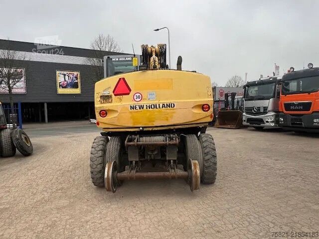 Escavadora de rodas New Holland MH Plus 2wege Bagger