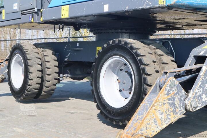 Macchina per la movimentazione dei materiali Fuchs MHL 320 | PEEL GRAB | UMSCHLAG | GOOD TIRES