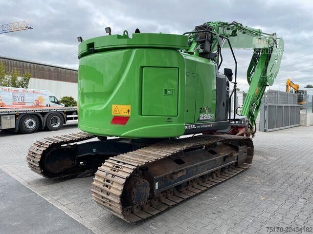 Tekerlekli ekskavatör Hitachi ZX225USLC-6 / 1.690h / OQ65 / Greifersäge