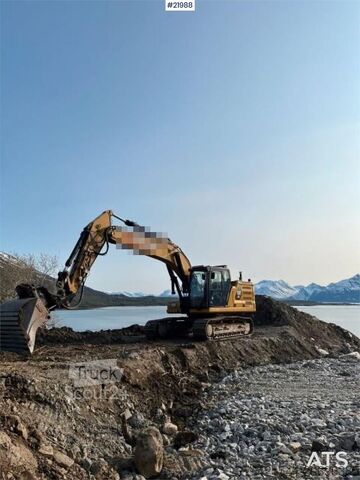 Kāpurķēžu ekskavators CAT 323