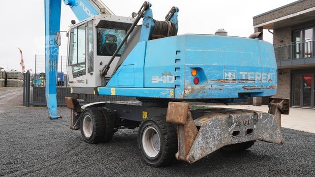 Gumikerekes kotrógép FUCHS MHL 340 Umschlagbagger Pratzen