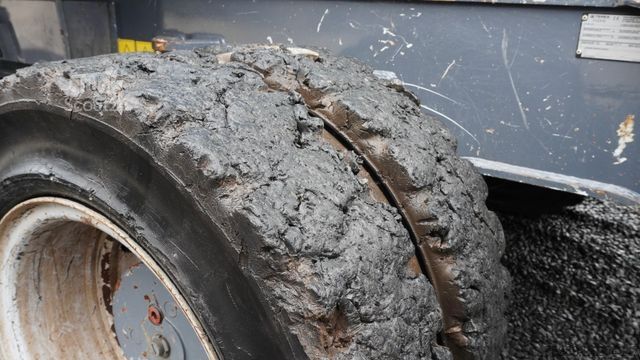 Gumikerekes kotrógép FUCHS MHL 340 Umschlagbagger Pratzen