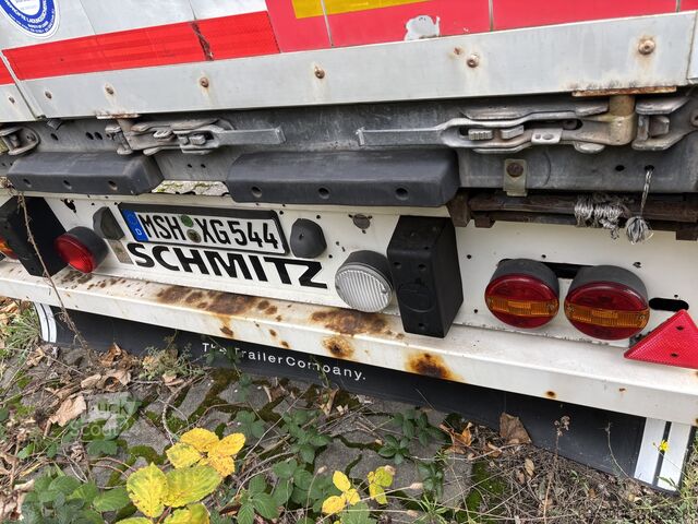 Rimorchio con pianale e telone Scmitz Auflieger Plane und Spriegel