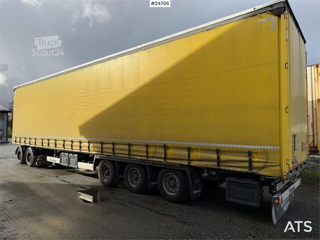 Reboque lonado Krone de 3 eixos com dolly Krone de 2 eixos Krone 3-axle curtain-sided trailer with 2-axle Krone dol
