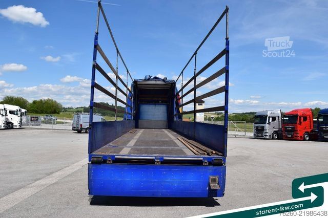 Åpen semitrailer med presenning Hangler Megatrailer Schräglader Coil Bordwand