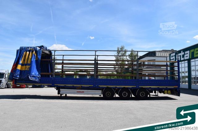 Åpen semitrailer med presenning Hangler Megatrailer Schräglader Coil Bordwand