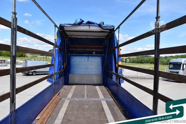 Åpen semitrailer med presenning Hangler Megatrailer Schräglader Coil Bordwand
