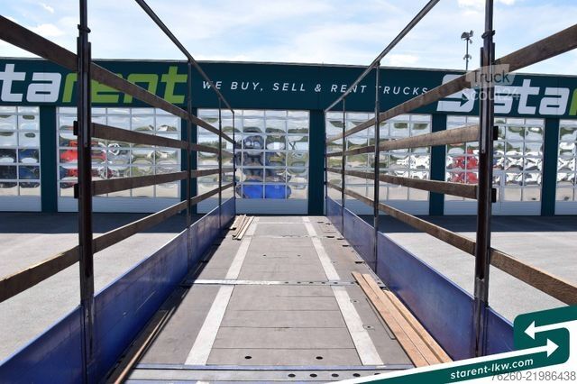 Åpen semitrailer med presenning Hangler Megatrailer Schräglader Coil Bordwand