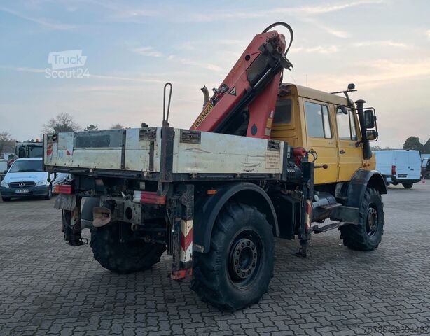 Lastbilsmonterad kran UNIMOG U 5000 Doka Pritsche/ PK 10.502 A/ AC/ AHK/ EU 3