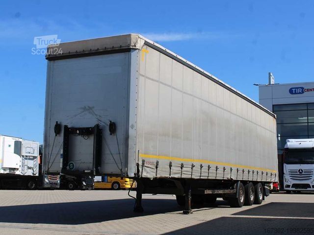 Semiremorcă deschisă cu prelată  SN 24 MEGA, SAF, LOWDECK, LIFTING AXLE,MULTILOCK