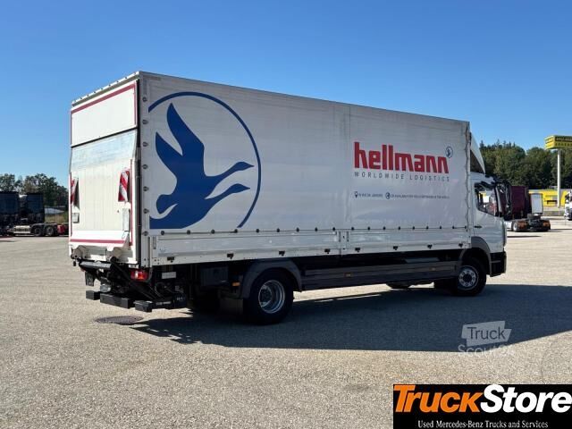 Вантажівка з платформою і тентом  Atego 1524 L