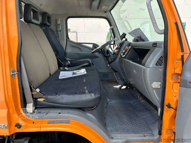 Camion à ordures MITSUBISHI FE Cante 7C18 / Zöller Micro XL 7 + Schüttung
