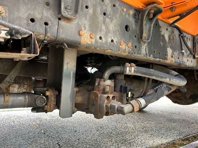 Camion à ordures MITSUBISHI FE Cante 7C18 / Zöller Micro XL 7 + Schüttung