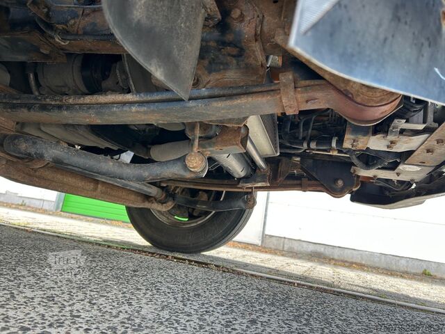 Camion à ordures MITSUBISHI FE Cante 7C18 / Zöller Micro XL 7 + Schüttung