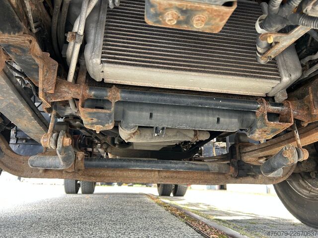Camion à ordures MITSUBISHI FE Cante 7C18 / Zöller Micro XL 7 + Schüttung