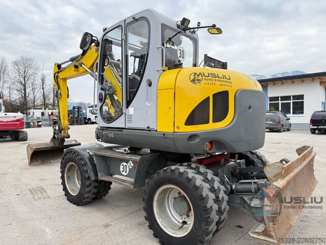 Koparka kołowa WACKER EW100 Powertilt 3X Löffeln Hammerleitung
